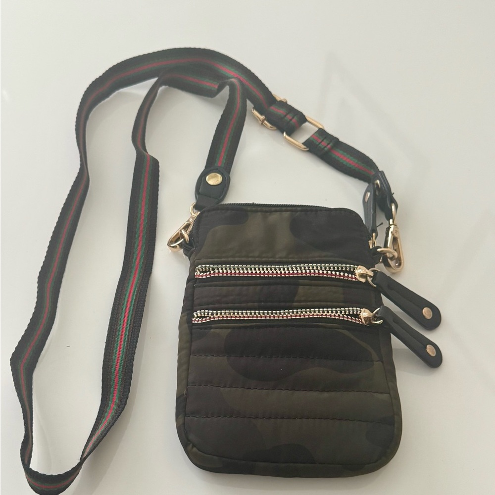Camo crossbody bag like new and never used with three zippered compartments